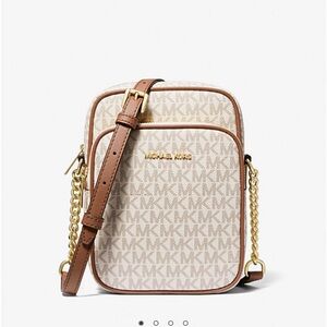Michael Kors Crossbody tan background with gray MK lettering throughout.  Cute!!
